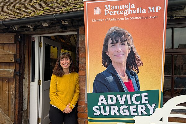 Manuela outside her advice surgery