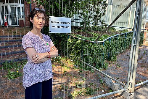 Manuela outside the BHS building